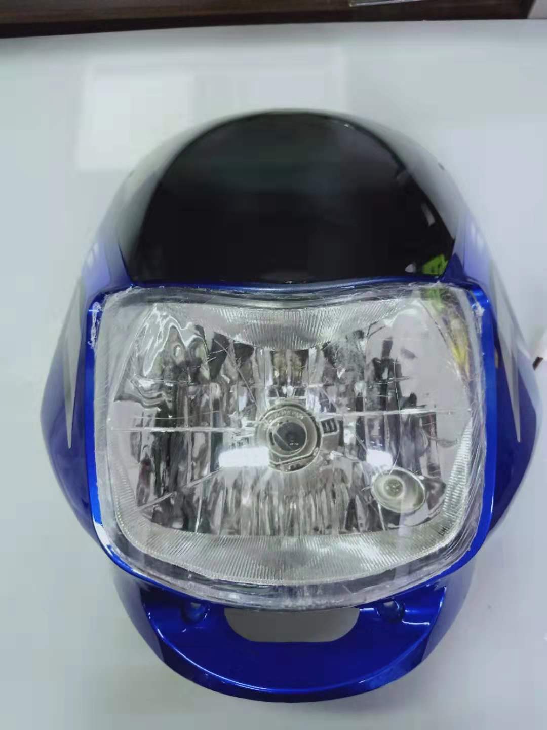 ct 100 headlight visor