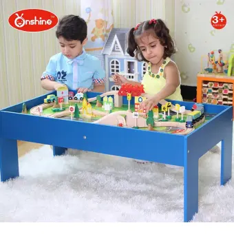 wooden table and train set