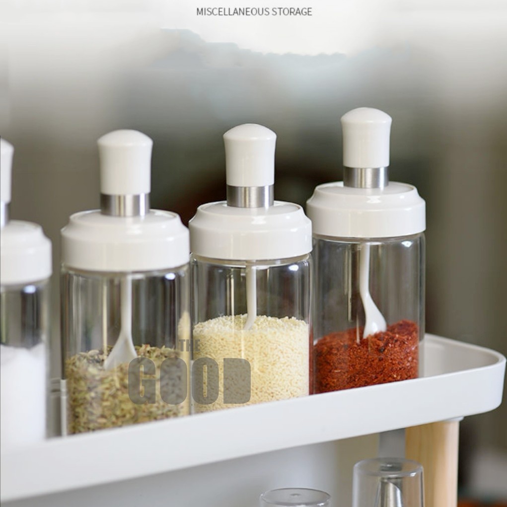 White glass shop spice jars