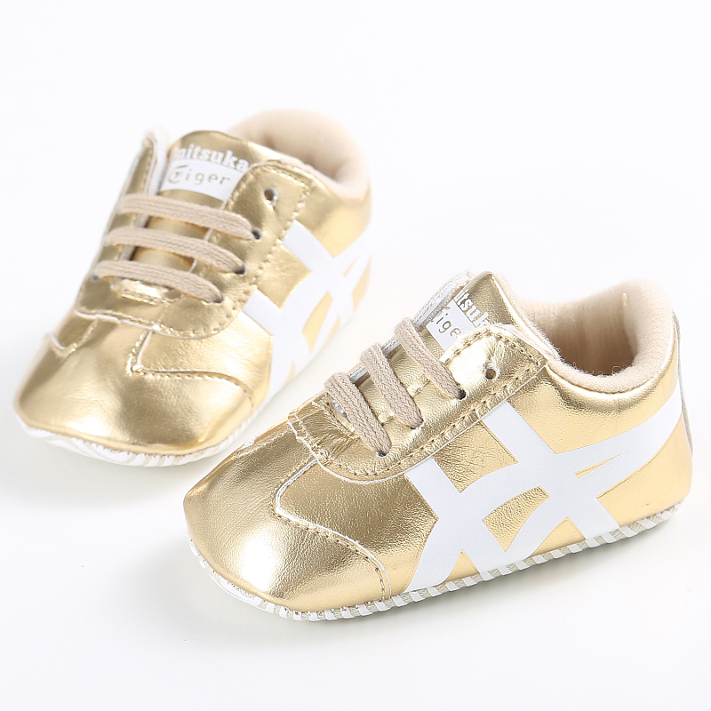 gold baby sneakers