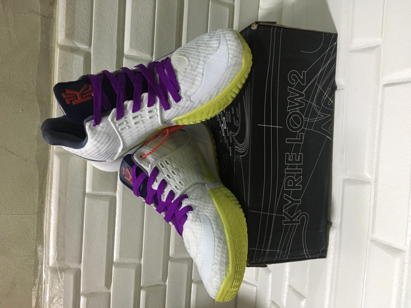 purple and green basketball shoes