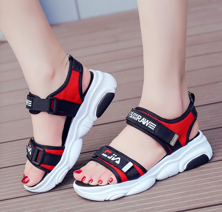 fila sandals on feet