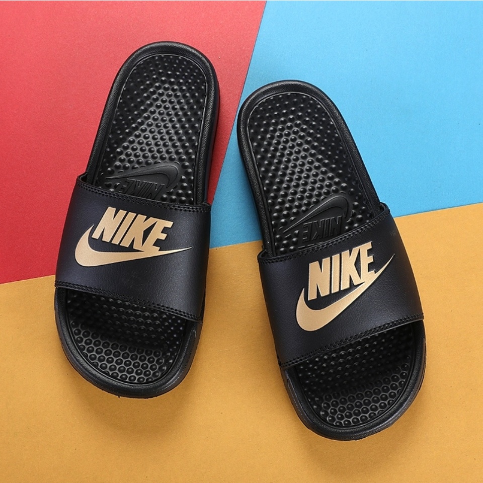 black and gold nike sandals
